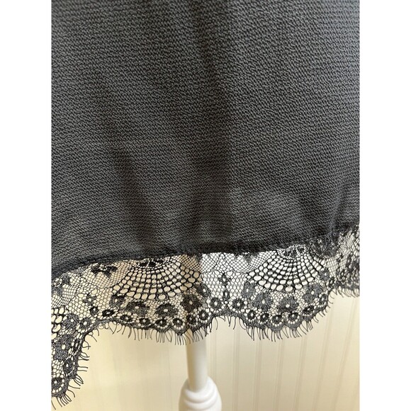 Torrid Sz 3 Black top. Lace shoulder and hem. Deed "V" back. Perfect summer top. - Picture 2 of 6